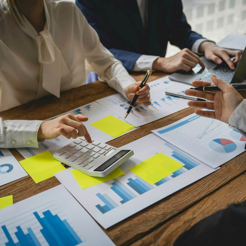 teamwork-with-business-people-consultant-describes-a-marketing-plan-to-set-business-strategies-busi.jpg